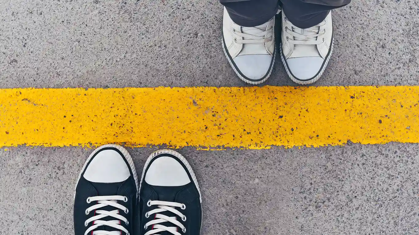 Weberg Law Asset Division After Divorce Feet By Yellow Line In Road
